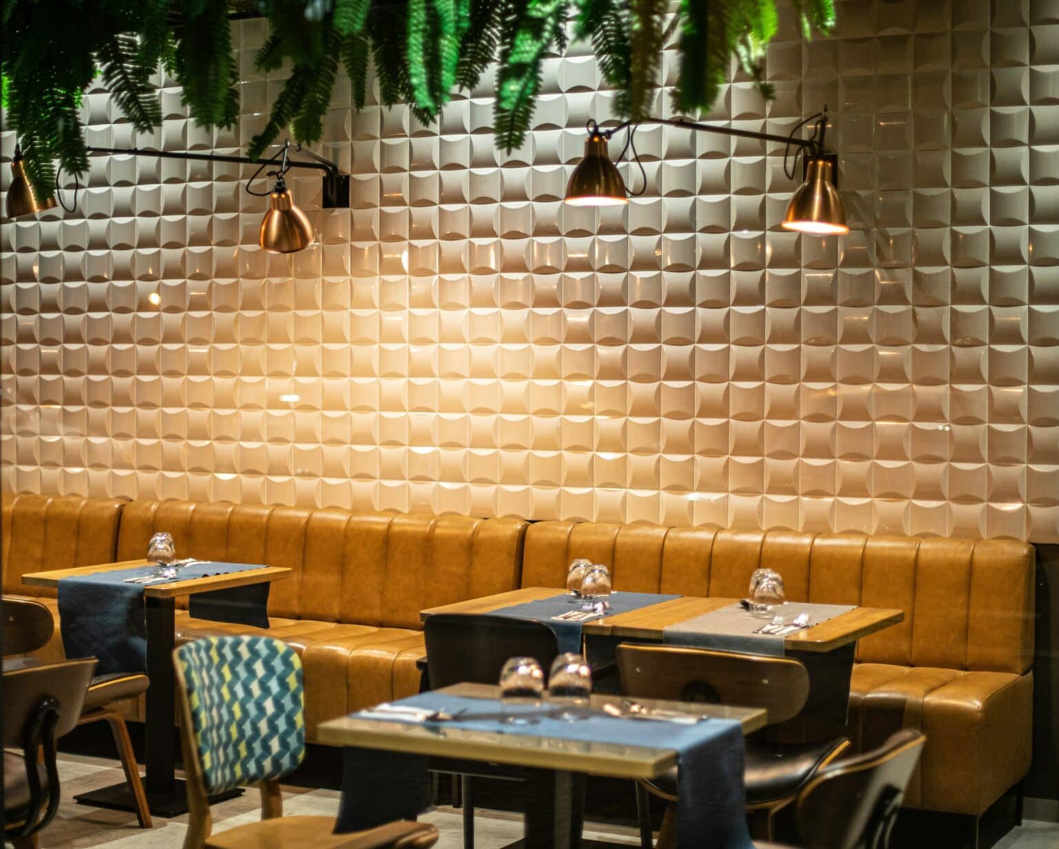 Restaurant area with tables and warm lighting, Commercial contractor in Brooklyn.