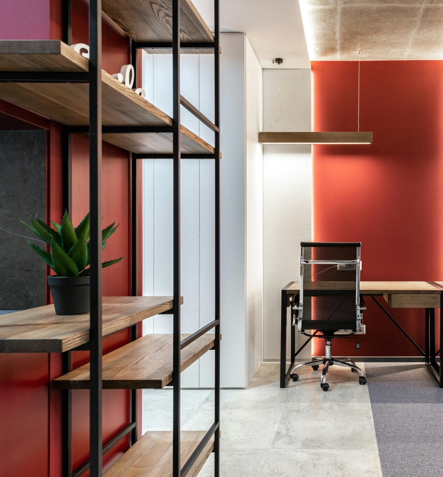 Interior painting in Manhattan. At-home office with red accent walls